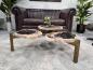 Preview: Design Couchtisch/Beistelltisch "Stone Age" aus versteinertem Holz